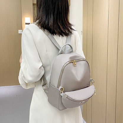 Dollcini Stílusos Női Hátizsák – Vízálló, Elegáns és Praktikus